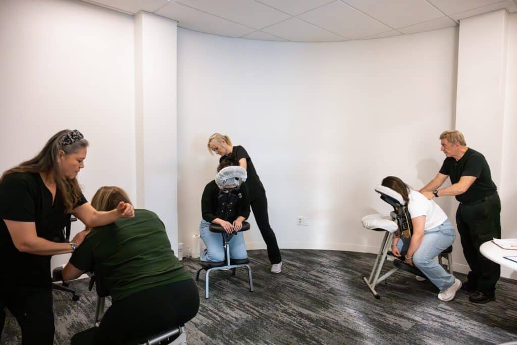 workplace wellness chair massage session mental health awareness event