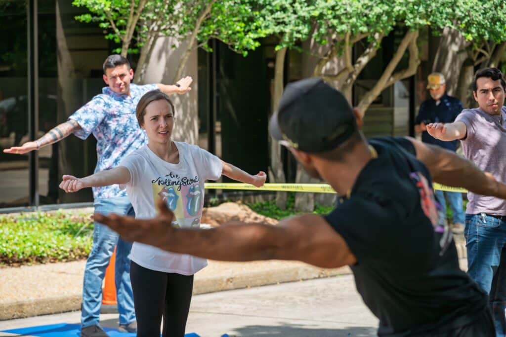 guided stretch session team wellness mental health awareness construction company