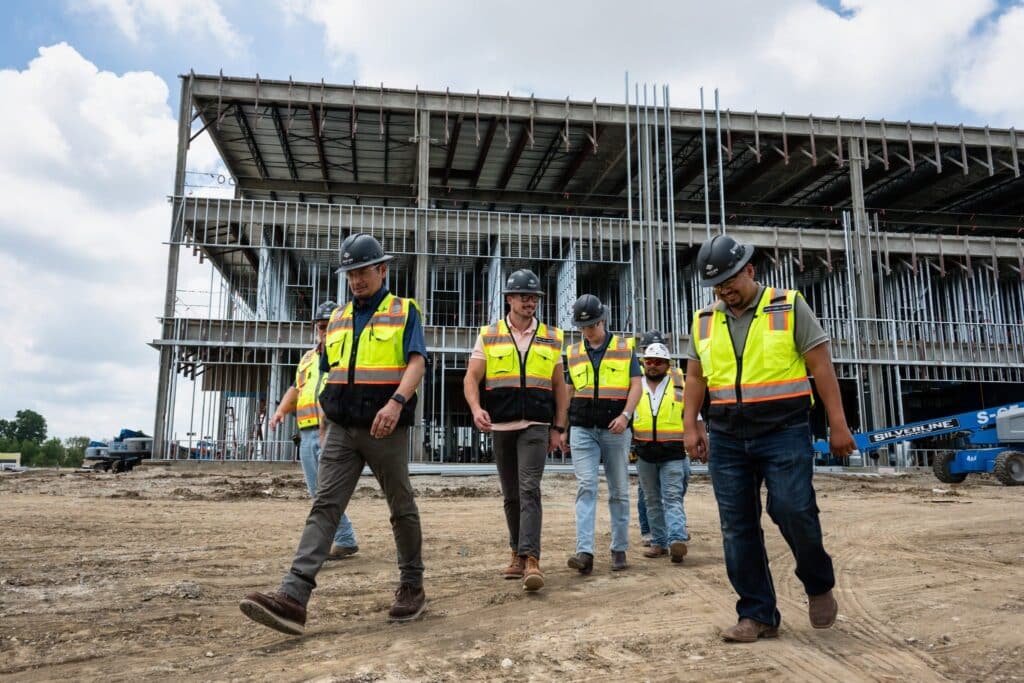 Skiles Group project team walks the Texas Health Huguley Medical Office Building construction site in Burleson.