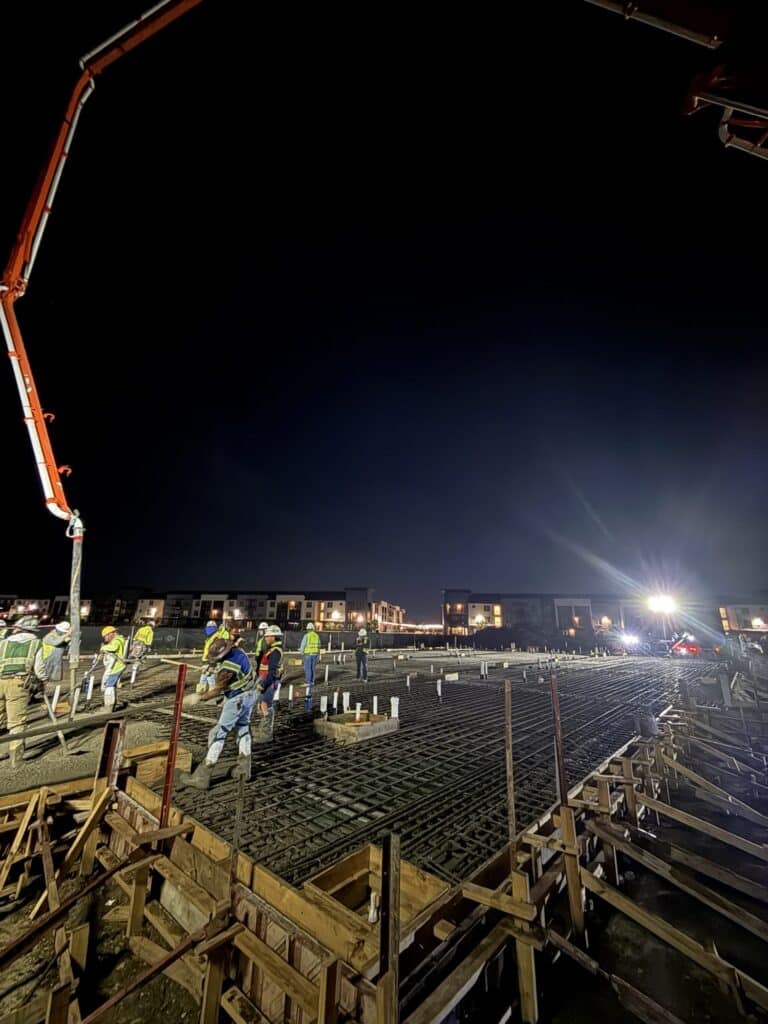 Overnight trade partner crews place concrete for the structural slab at the TMI Sports Medicine ASC project.