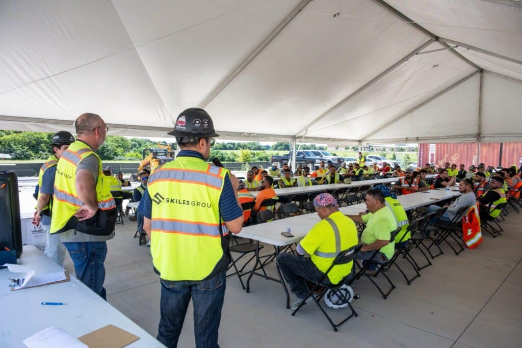Project leaders address trade partners during the Texas Health Midlothian topping out celebration.